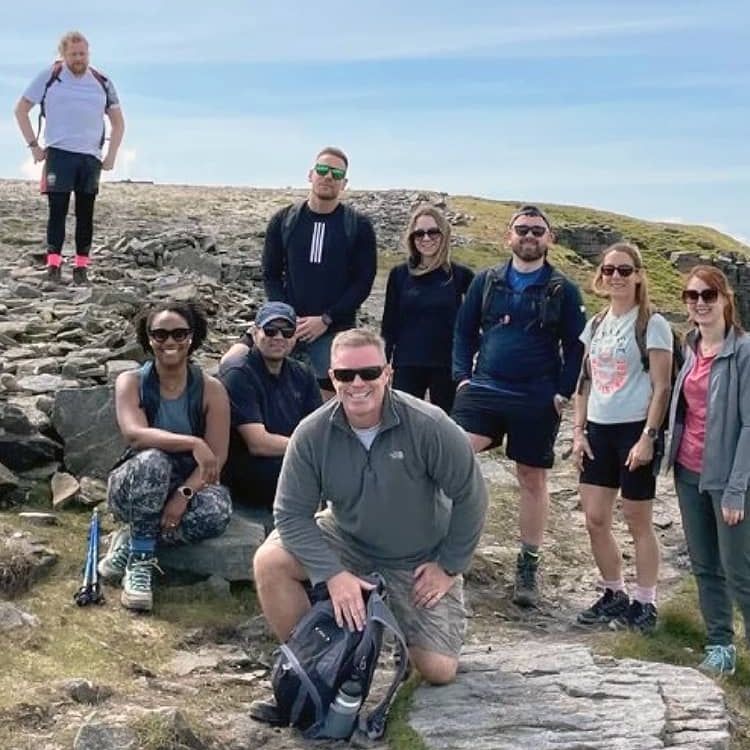 Cornerstone team on taking a picture on mountain